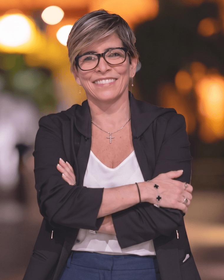Mel Konsta a grey blonde white woman smiling